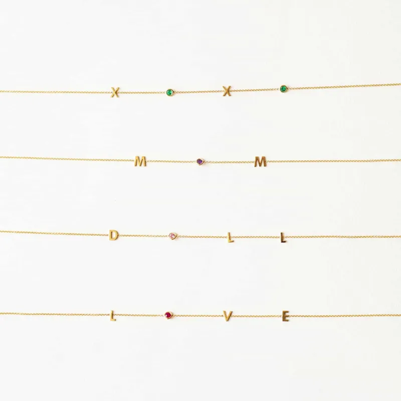 Word Spell Necklace sold by Baby Gold