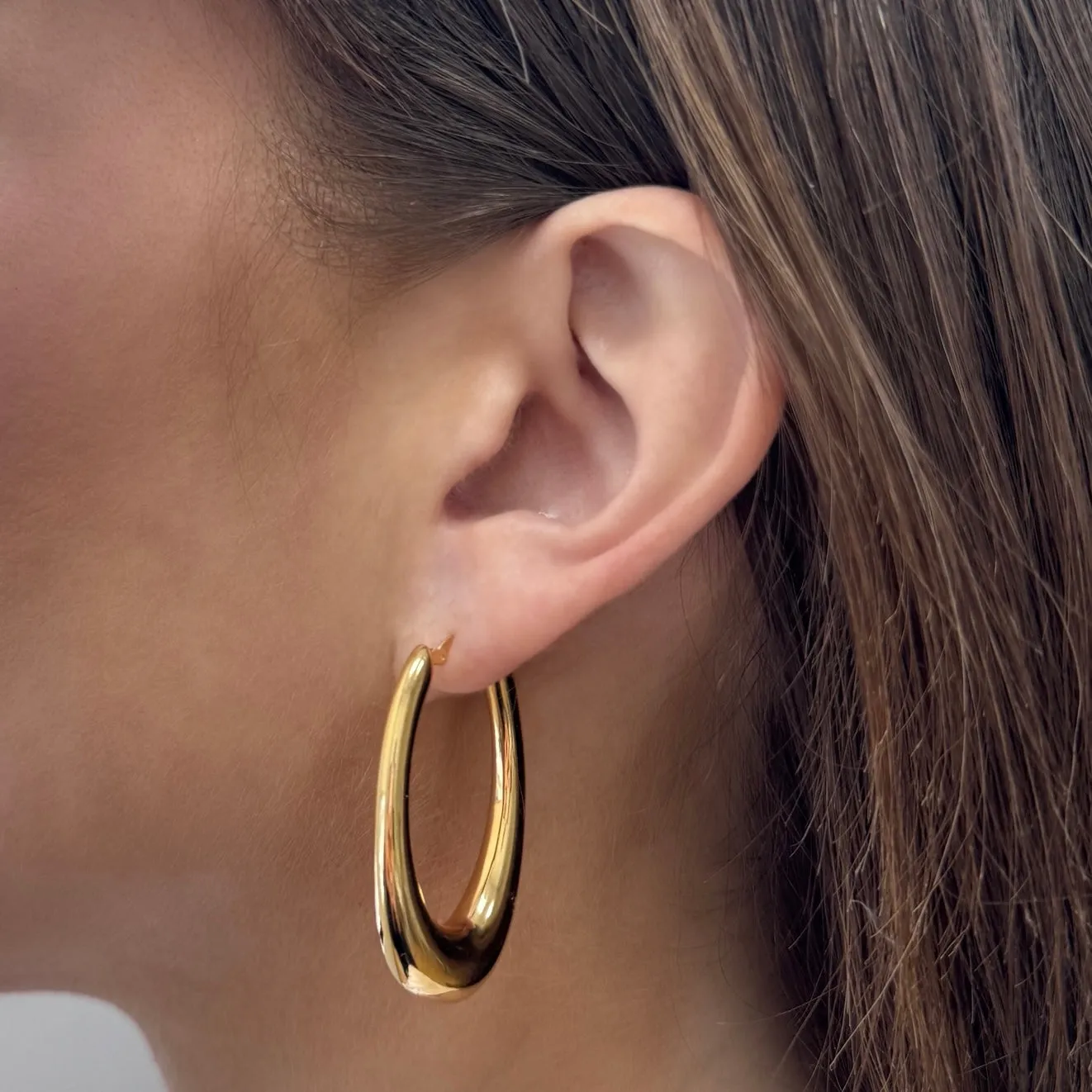 Oval Curved Hoop Earrings sold by Baby Gold product image thumbnail 3