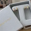 Sparkle Tapered Huggies Hoops sold by Baby Gold