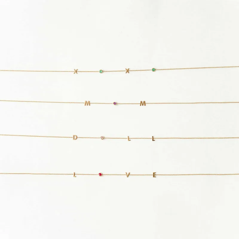 Word Spell Bracelet sold by Baby Gold