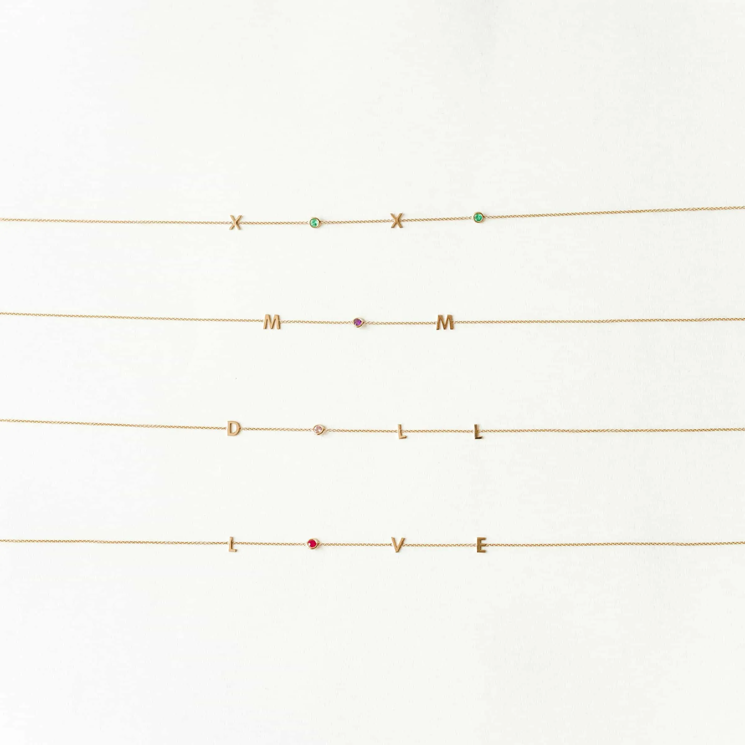 Word Spell Bracelet sold by Baby Gold