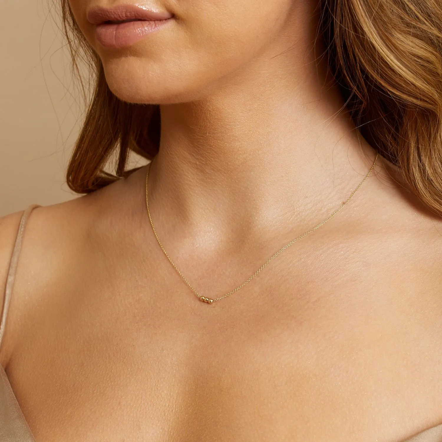 Dainty Trio Ball Necklace sold by Baby Gold product image thumbnail 4
