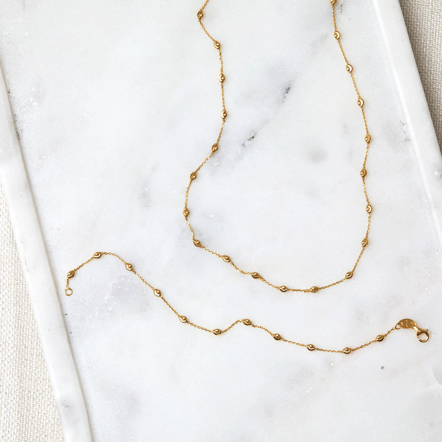 Spaced Mooncut Bead Necklace sold by Baby Gold product image thumbnail 3