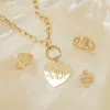 Heart Monogram Charm sold by Baby Gold