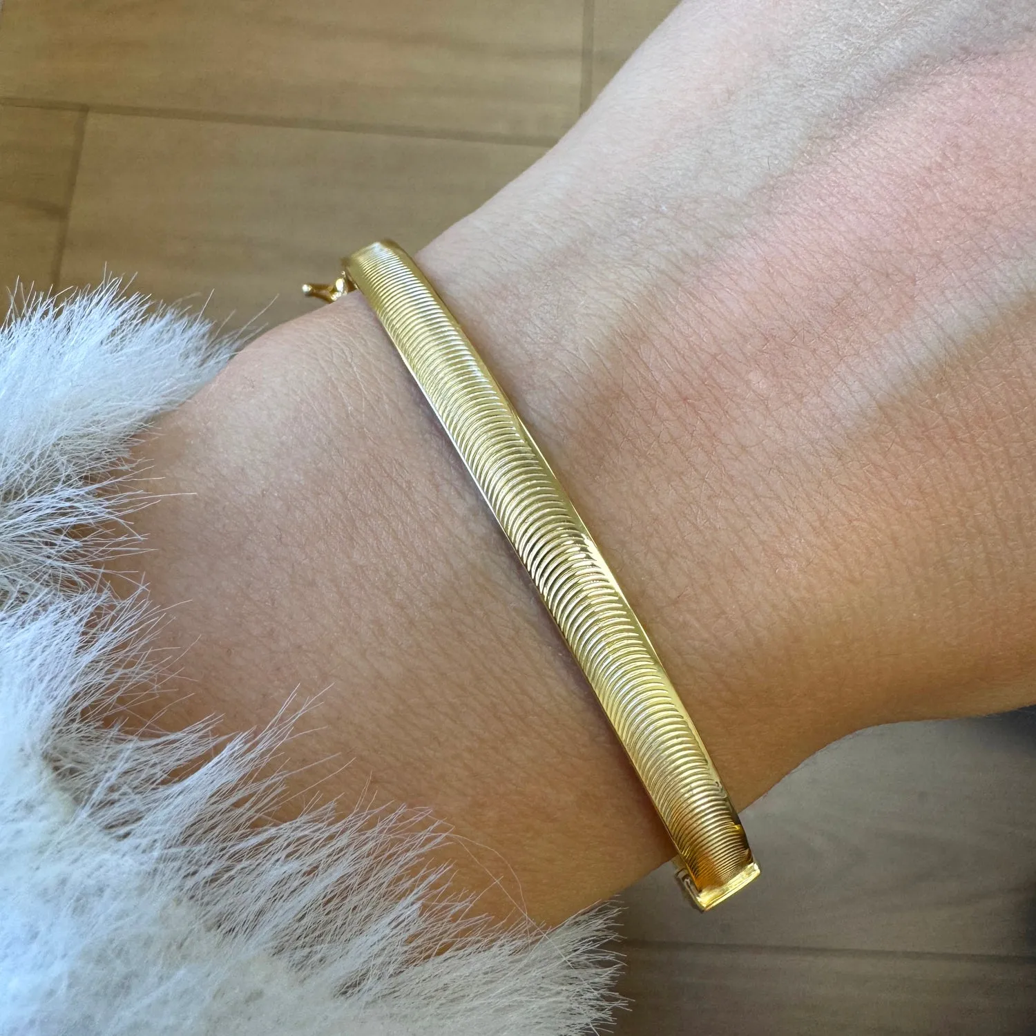 Wide Crescent Cut Bangle (5mm) sold by Baby Gold product image thumbnail 3