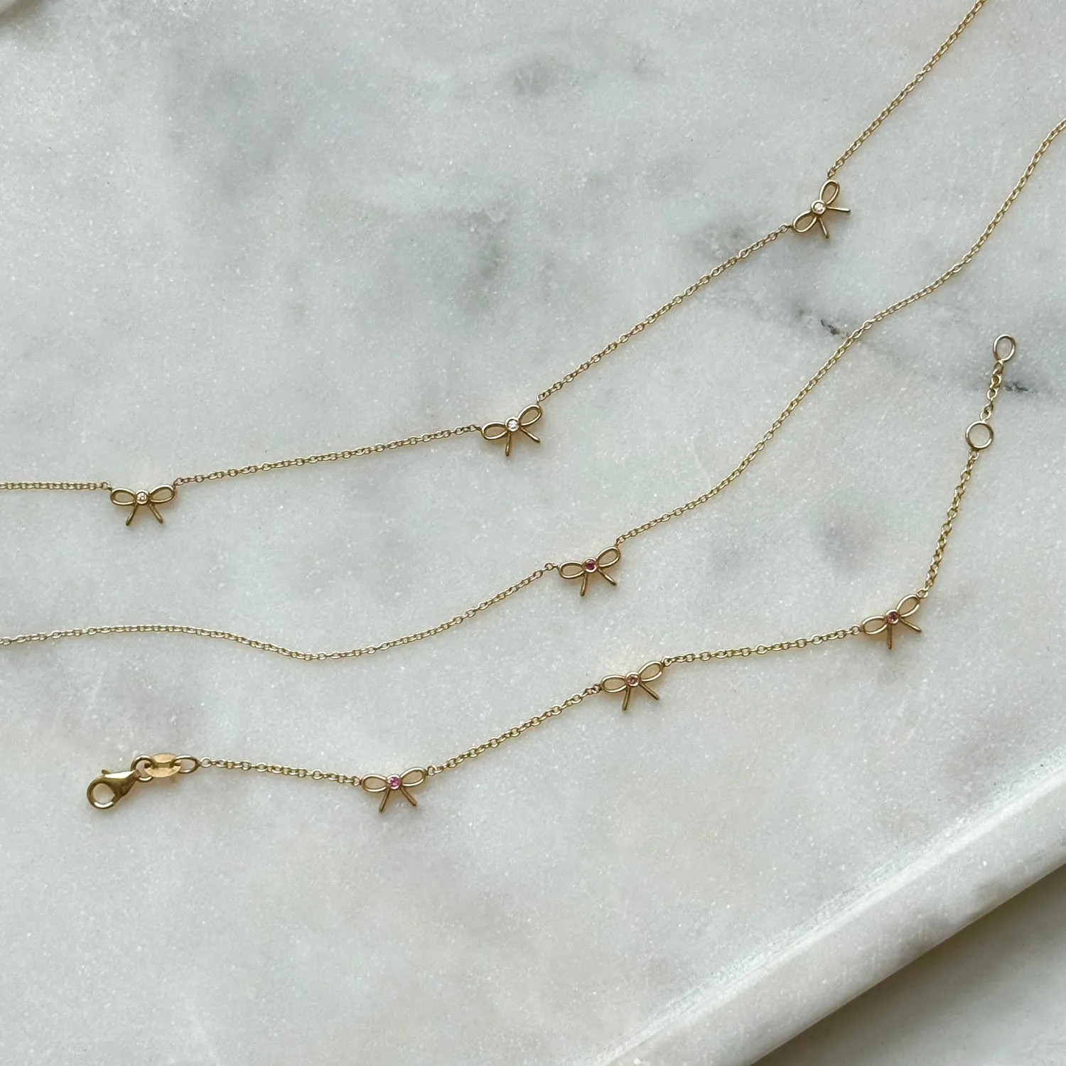 Dainty Pink Sapphire Bow Necklace sold by Baby Gold product image thumbnail 4