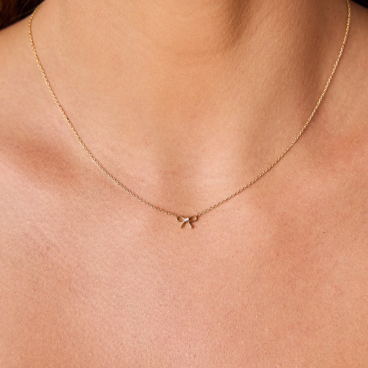 Dainty Diamond Bow Necklace sold by Baby Gold product image thumbnail 5