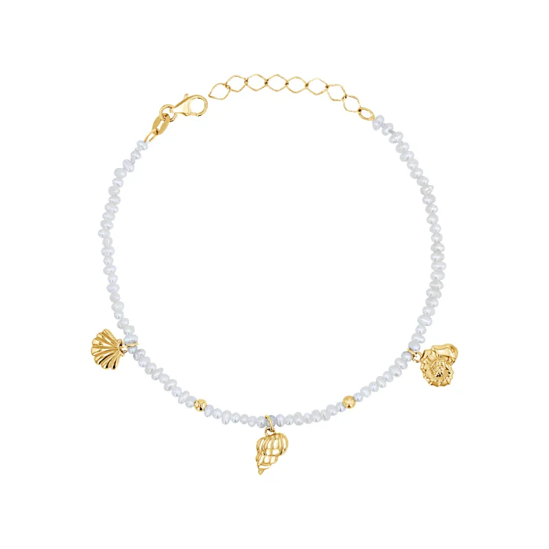 Seashell Charm Station Pearl Bracelet sold by Baby Gold