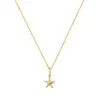 Soleil Star Seashell Charm sold by Baby Gold
