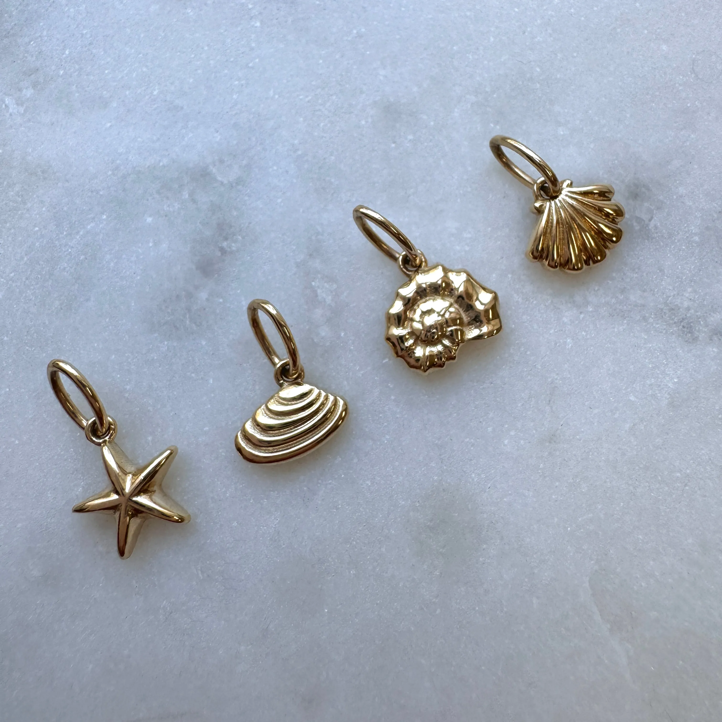 Soleil Star Seashell Charm sold by Baby Gold product image thumbnail 5