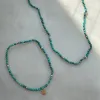 Turquoise & Faceted Gold Bead Necklace sold by Baby Gold