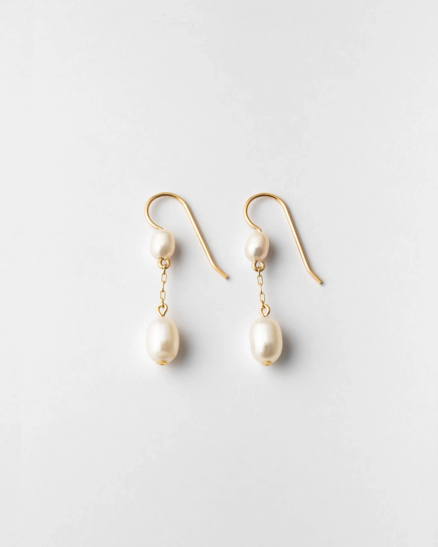 Deux Pearl Drop Earrings sold by GLDN