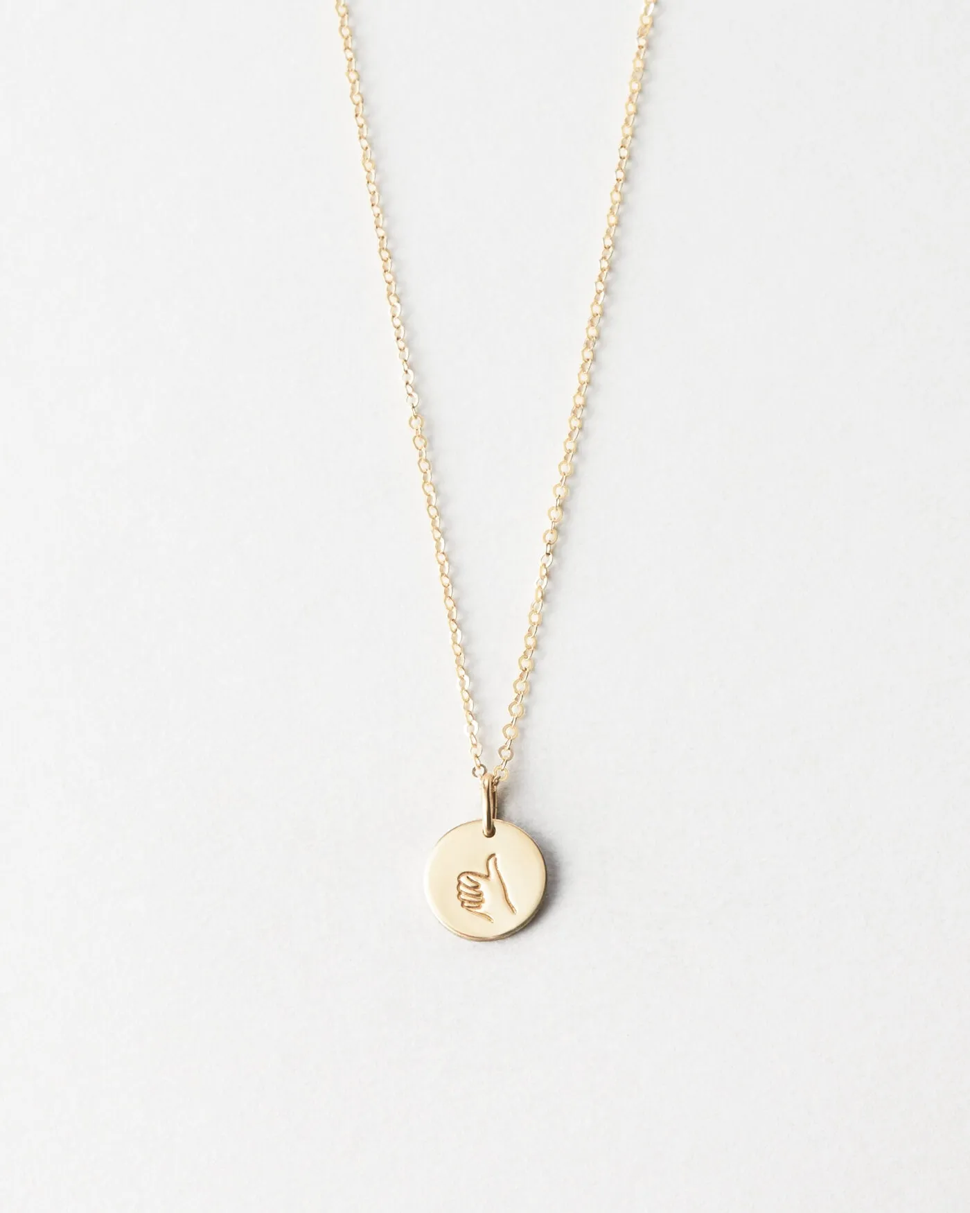 Thumbs Up Necklace sold by GLDN