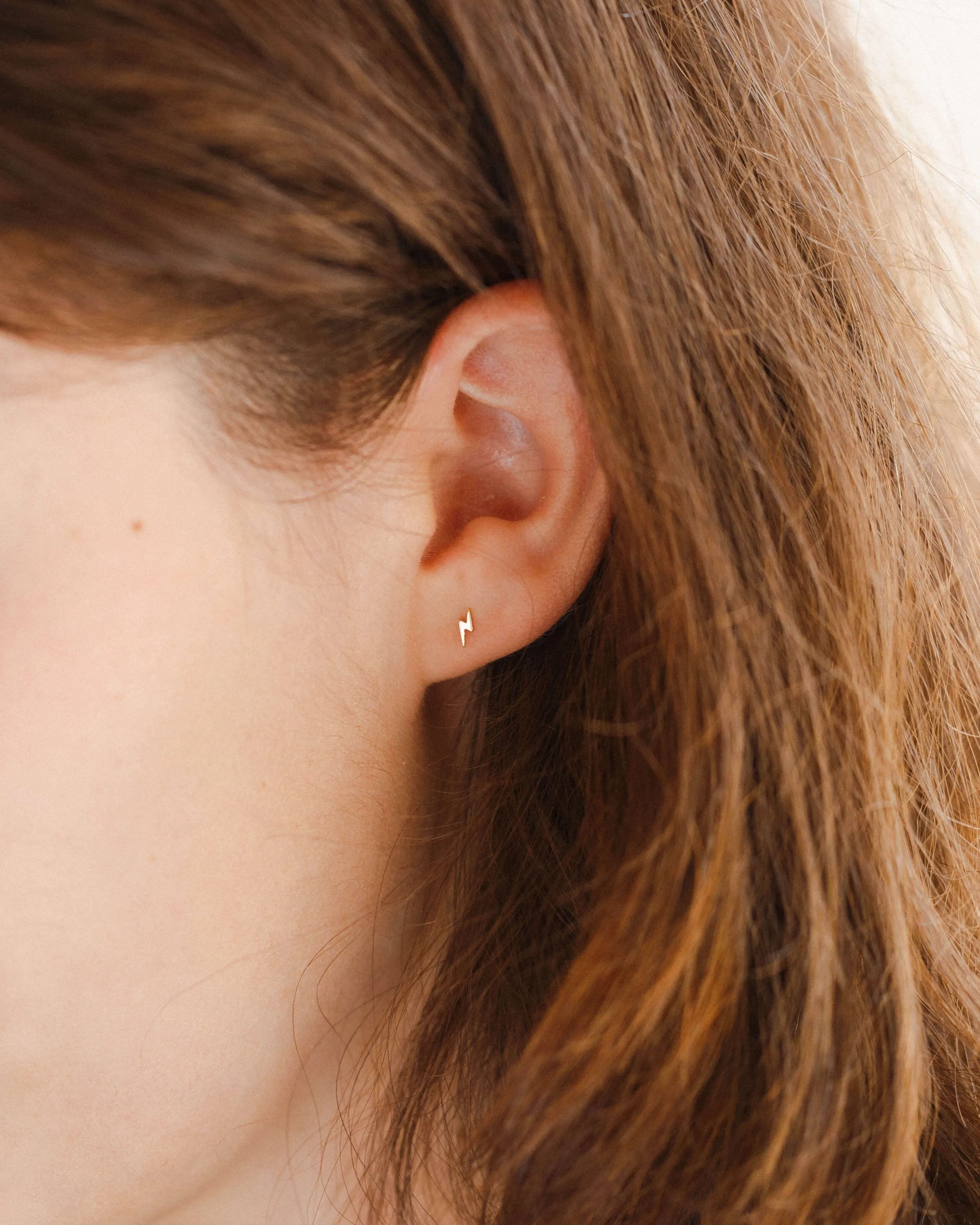 High Voltage Studs sold by GLDN