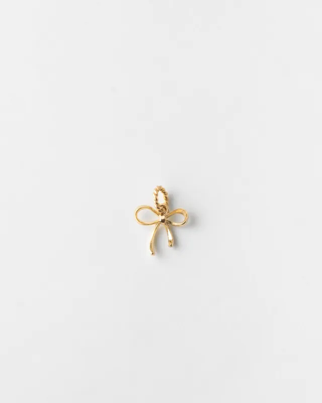 Bow Necklace Charm sold by GLDN