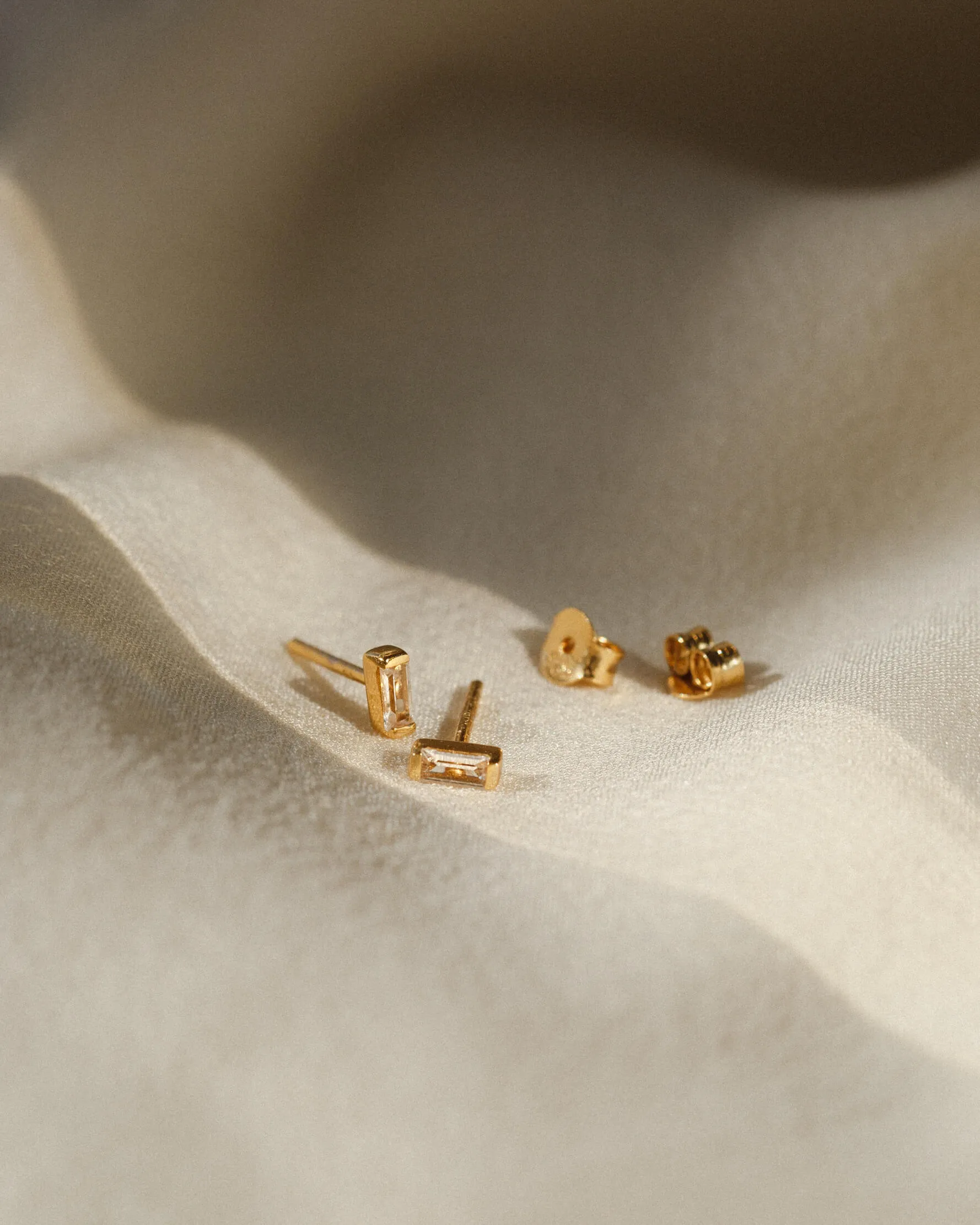 Deco White Sapphire Studs sold by GLDN product image thumbnail 3