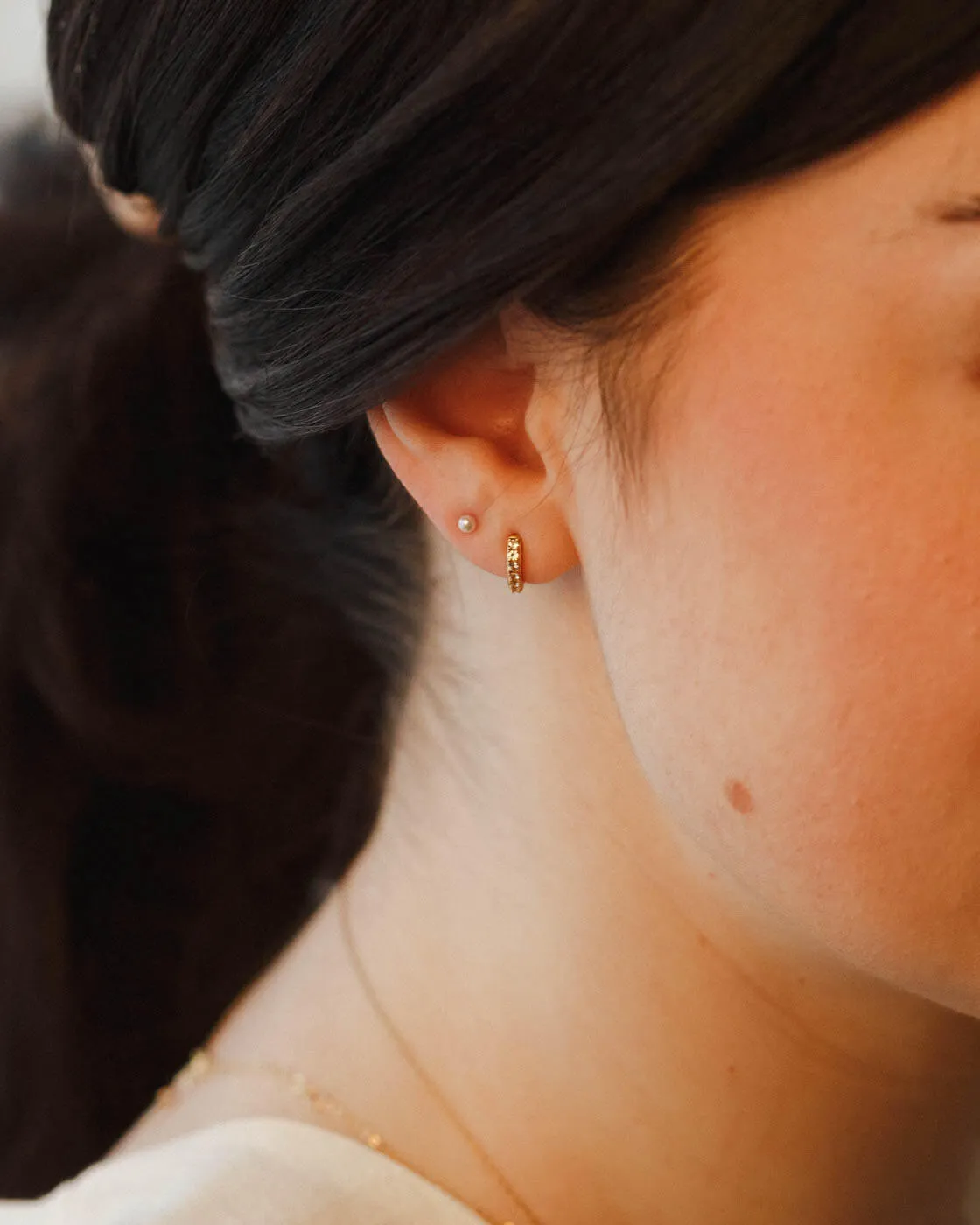 Ona White Sapphire Huggie Hoops sold by GLDN product image thumbnail 2