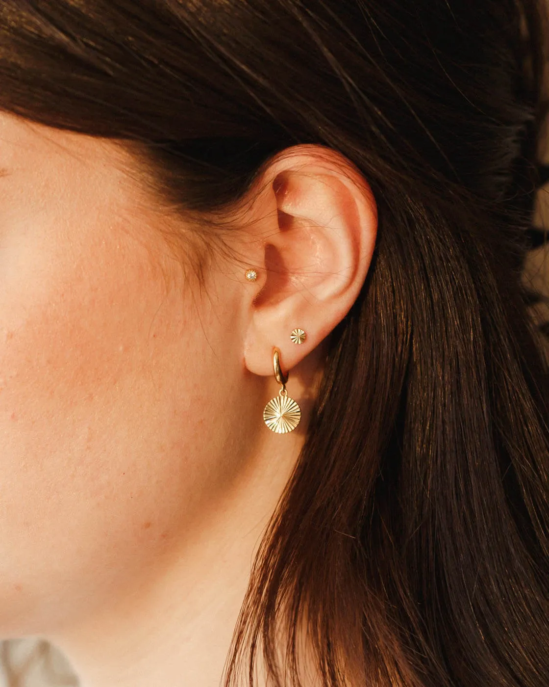 Radiant Charm Huggie Hoops sold by GLDN product image thumbnail 2