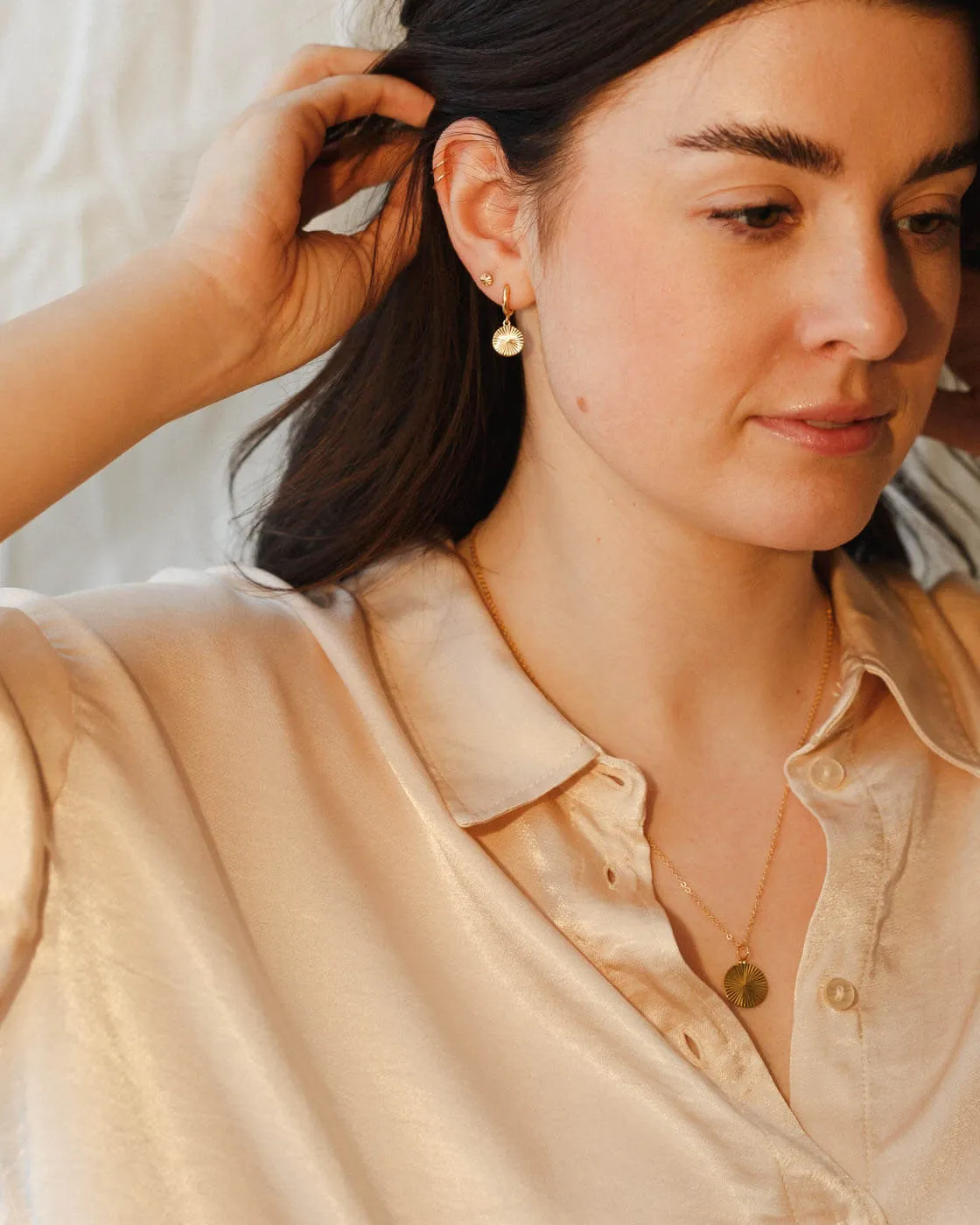 Radiant Charm Huggie Hoops sold by GLDN product image thumbnail 5