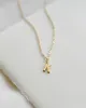 Dainty Serif Initial Necklace sold by GLDN