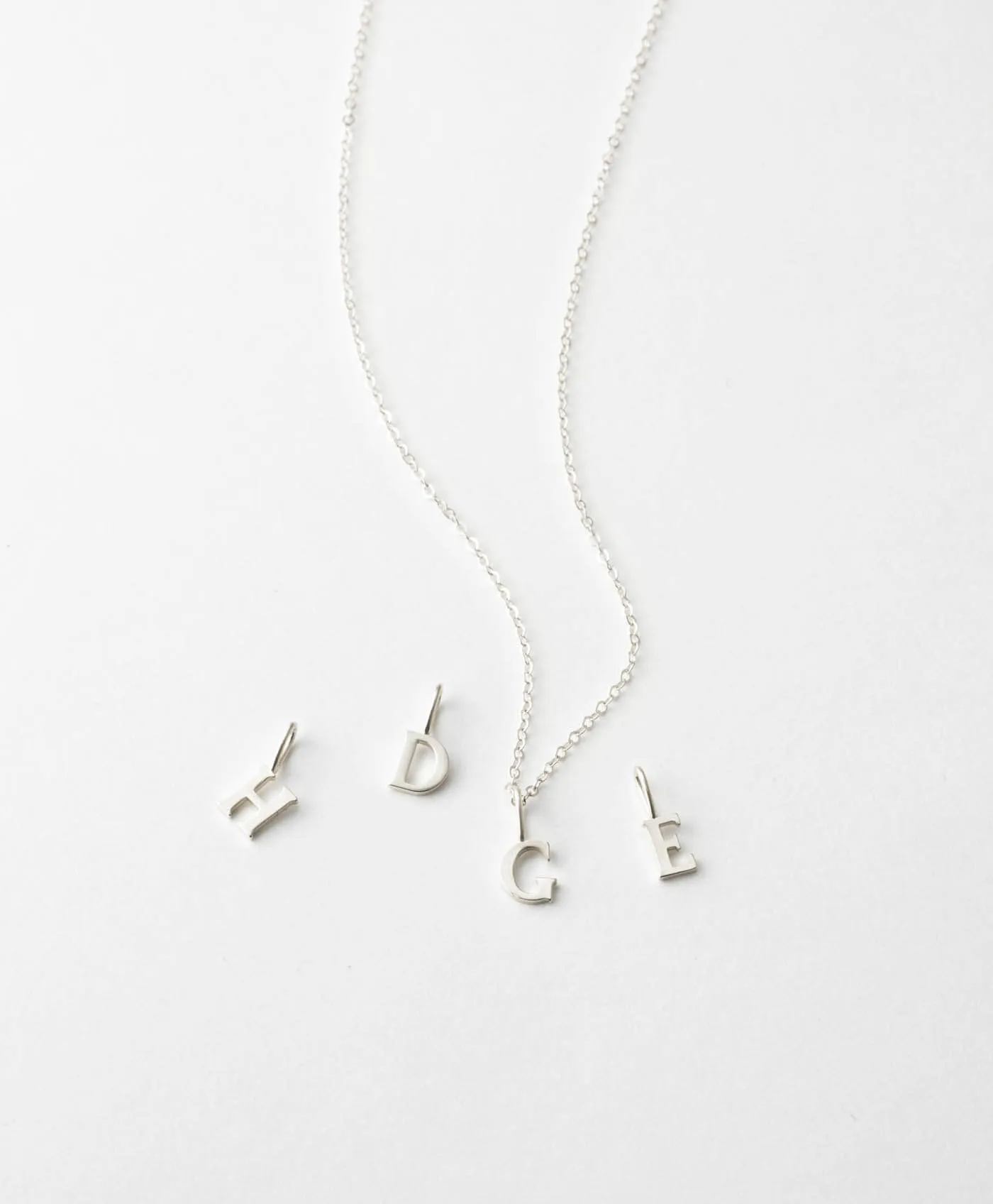 Dainty Serif Initial Necklace sold by GLDN product image thumbnail 2