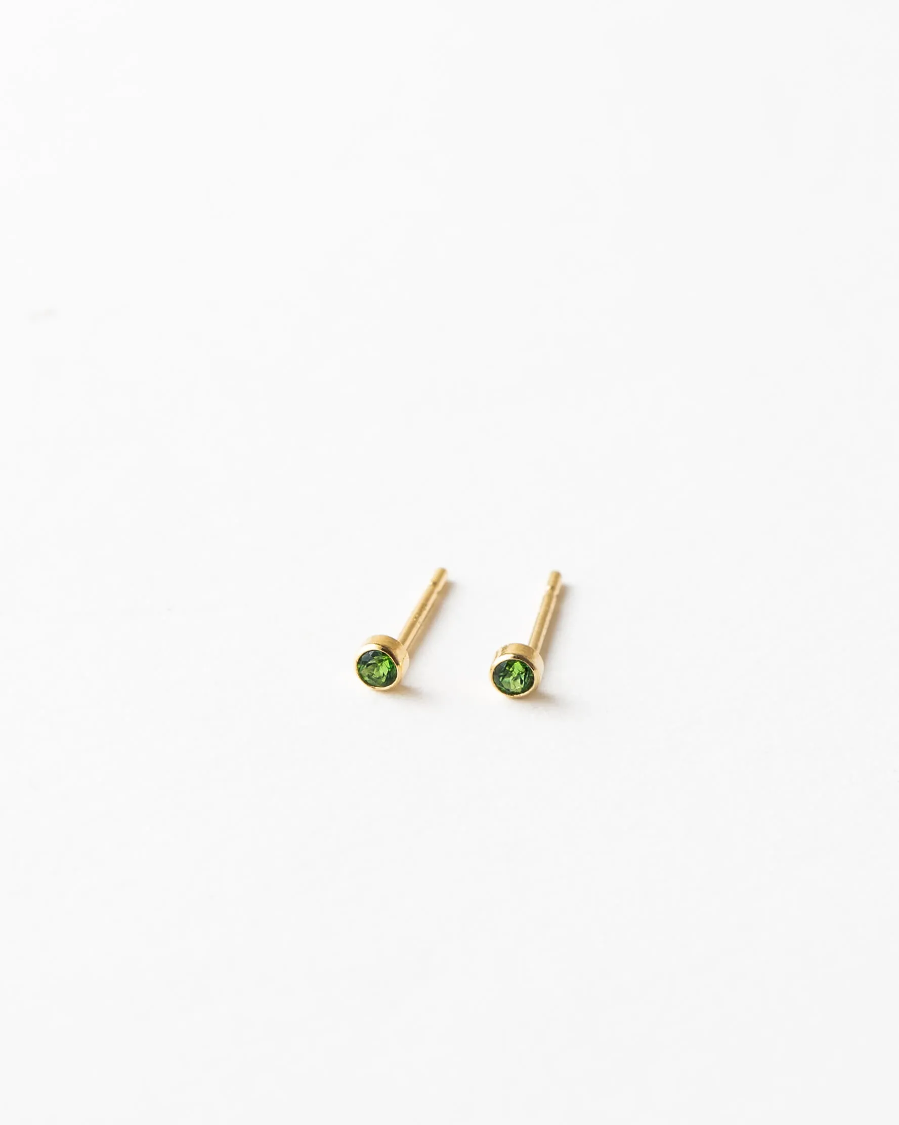Emerald Green Aura Studs sold by GLDN