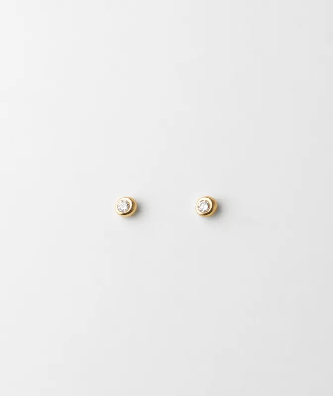 Gaia White Sapphire Solitaire Studs sold by GLDN