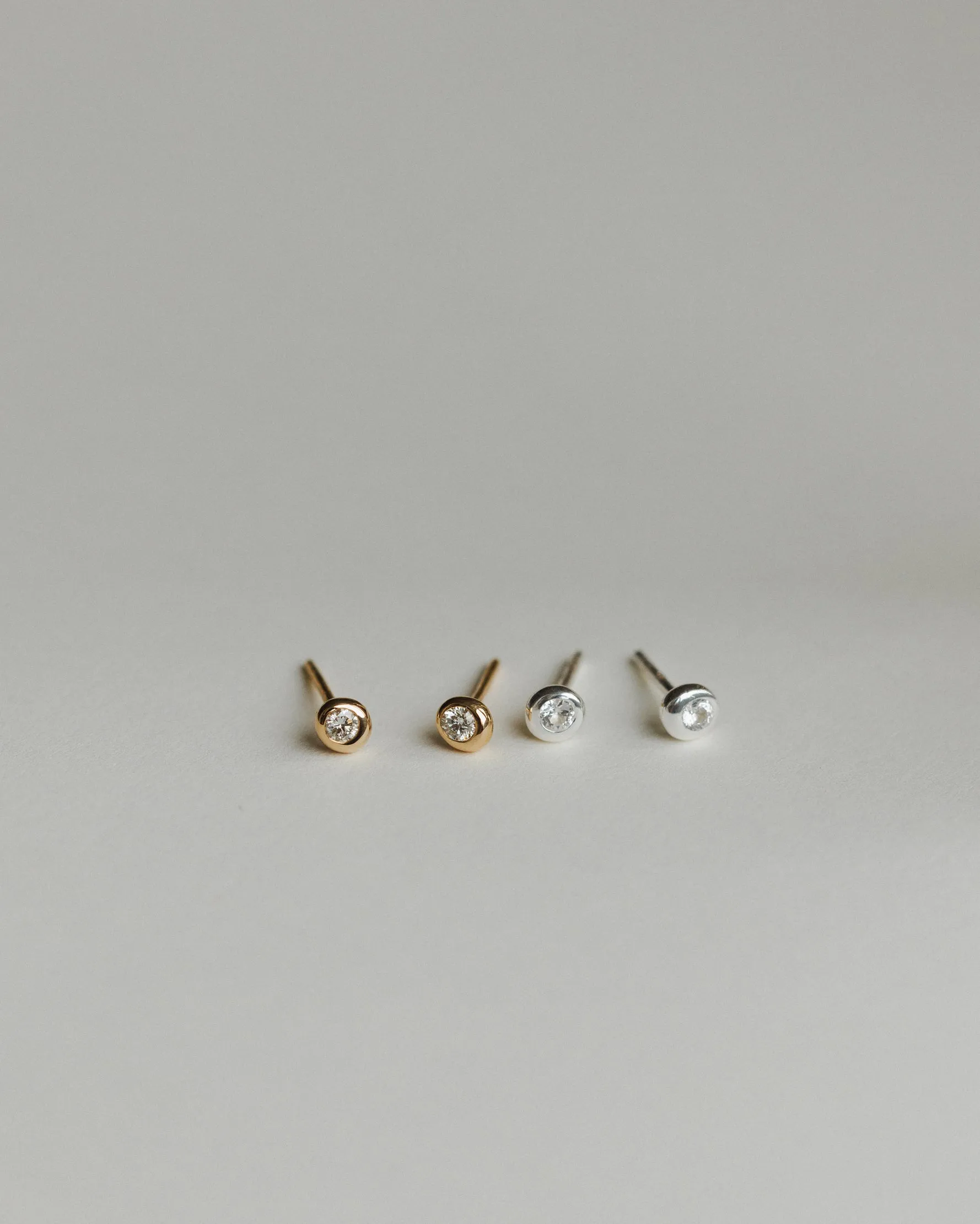 Gaia White Sapphire Solitaire Studs sold by GLDN product image thumbnail 4