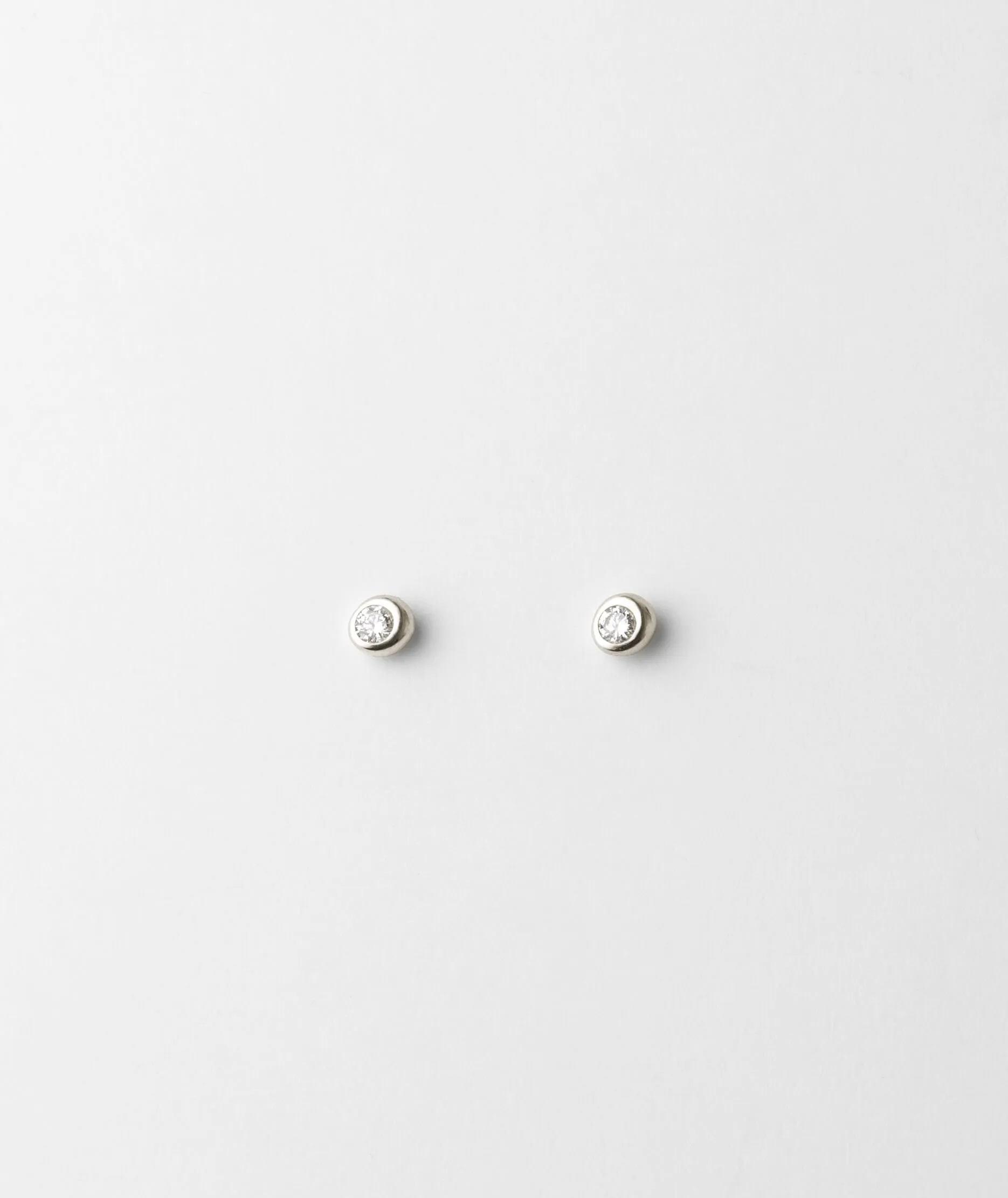Gaia White Sapphire Solitaire Studs sold by GLDN product image thumbnail 2