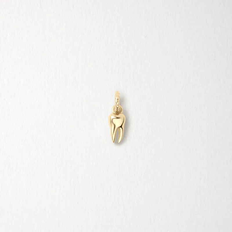 Tooth Charm sold by GLDN