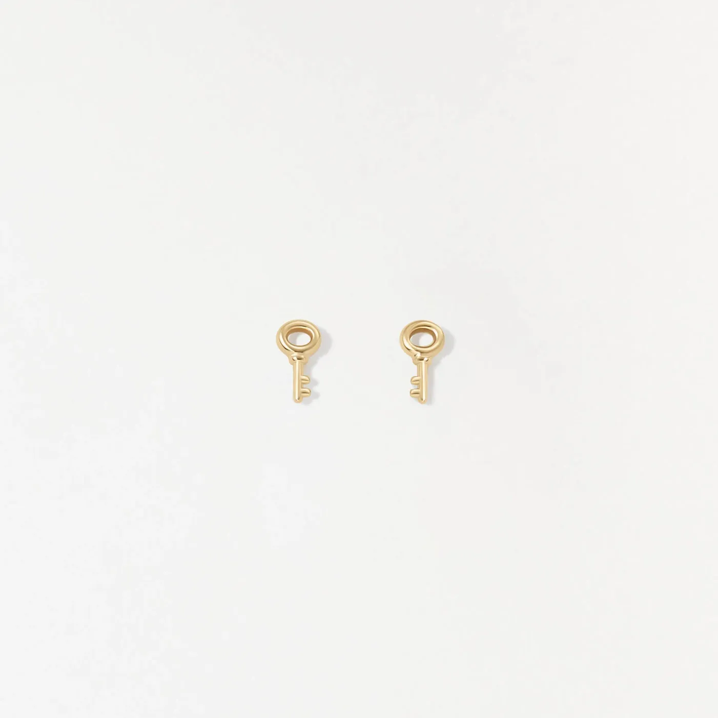Solid Gold Skeleton Key Studs sold by GLDN