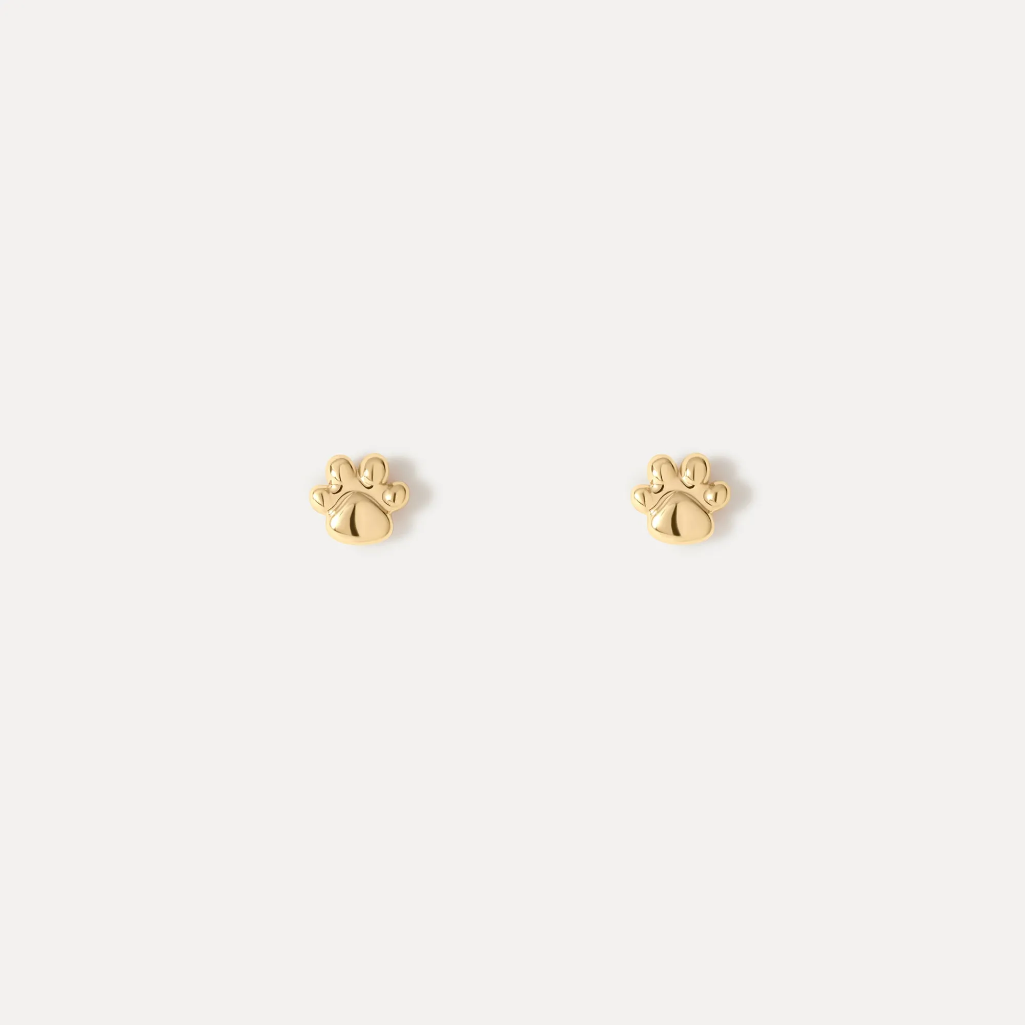 Paw Print Studs sold by GLDN