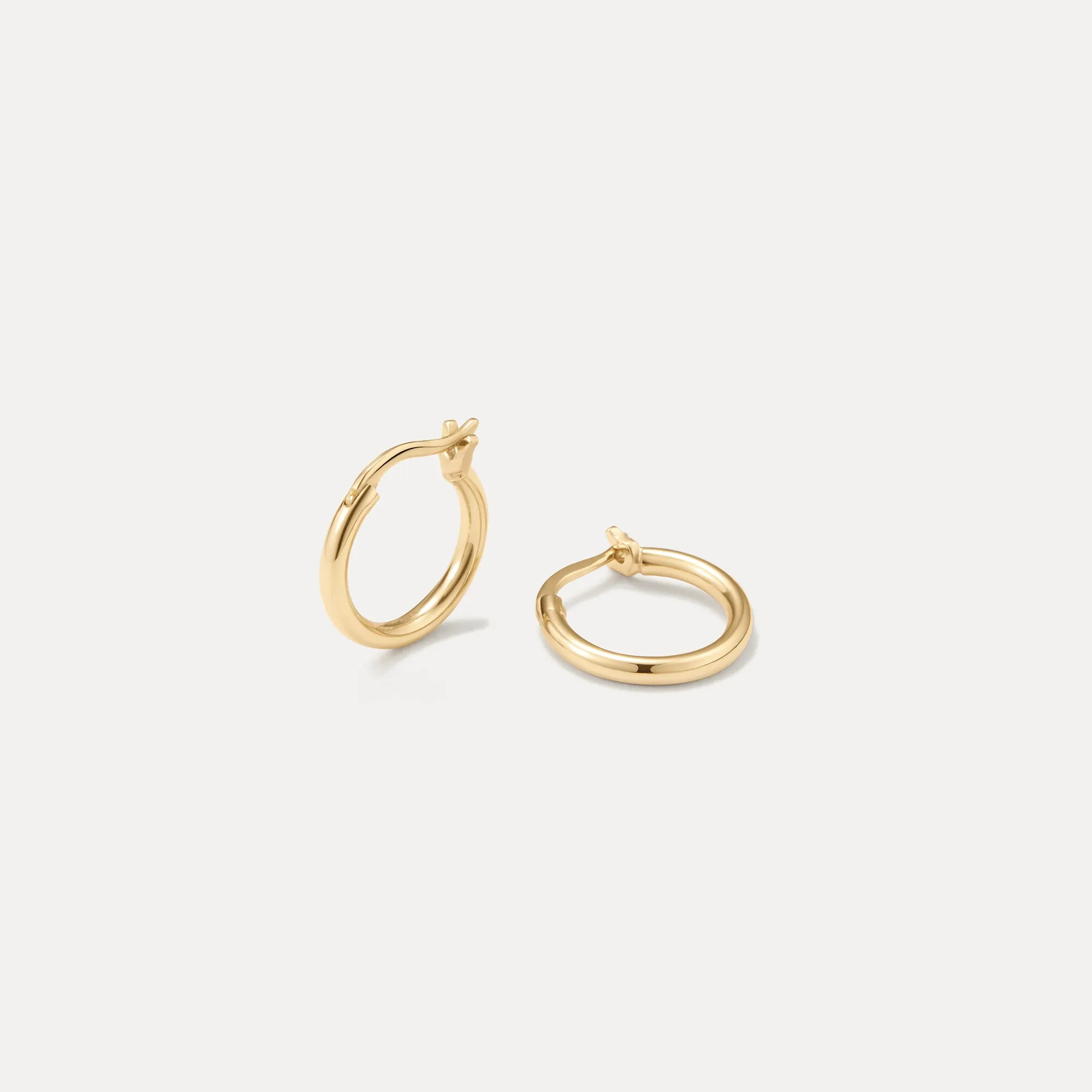 Solid Gold 24/7 Huggie Hoops sold by GLDN