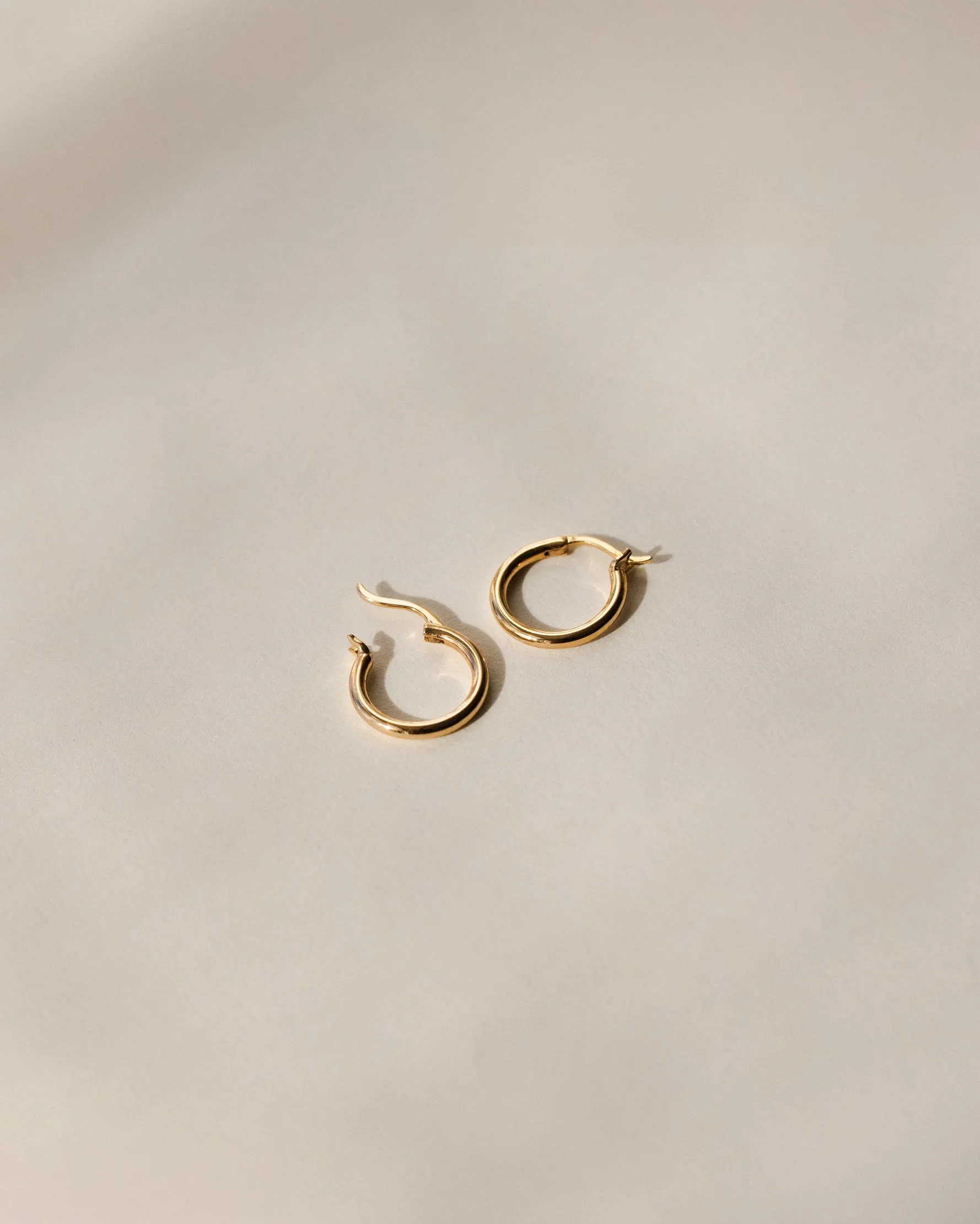 Solid Gold 24/7 Huggie Hoops sold by GLDN product image thumbnail 3