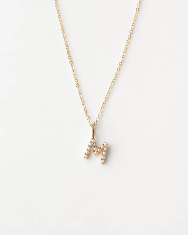 Pearl Initial Necklace sold by GLDN