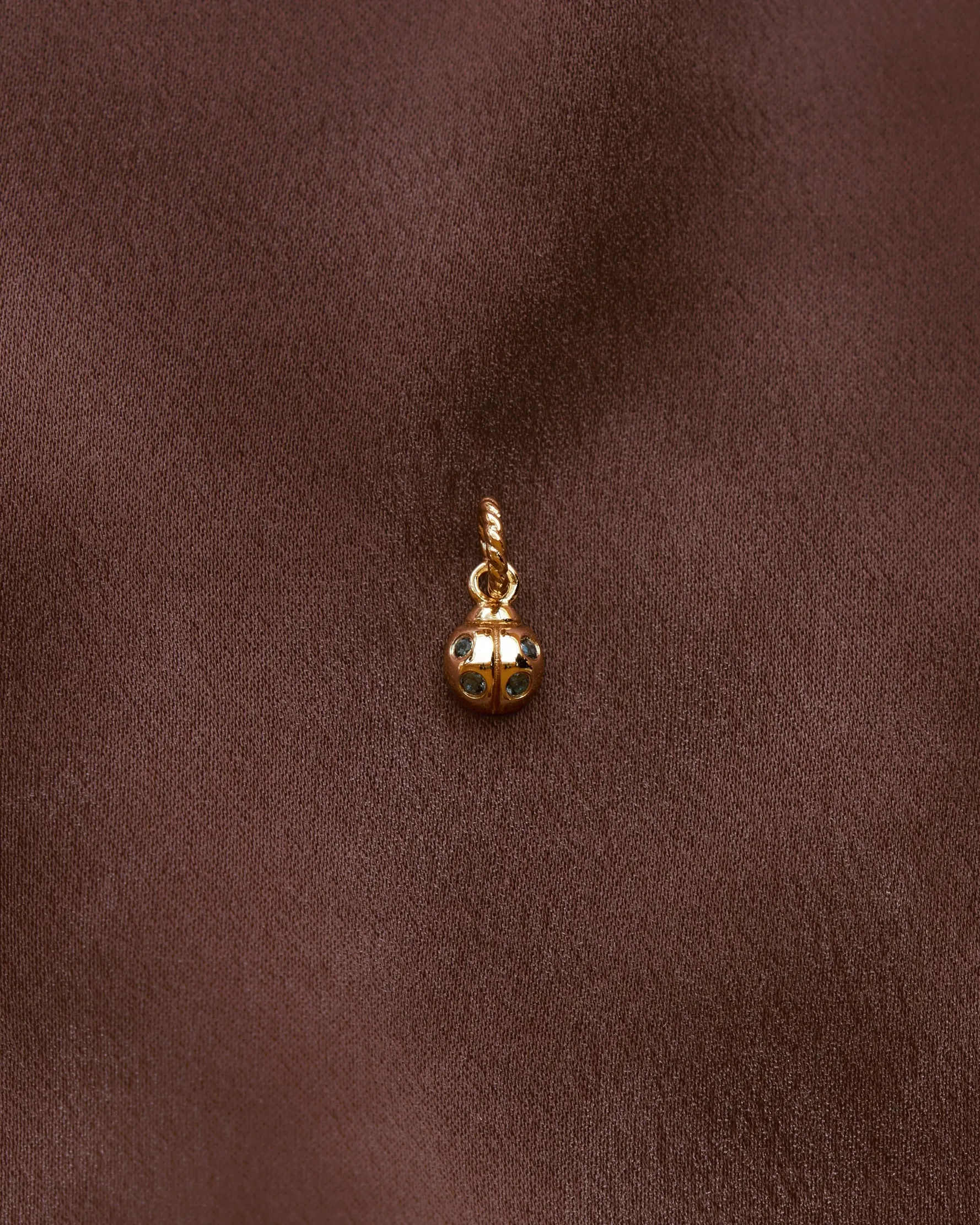 Ladybug Charm sold by GLDN