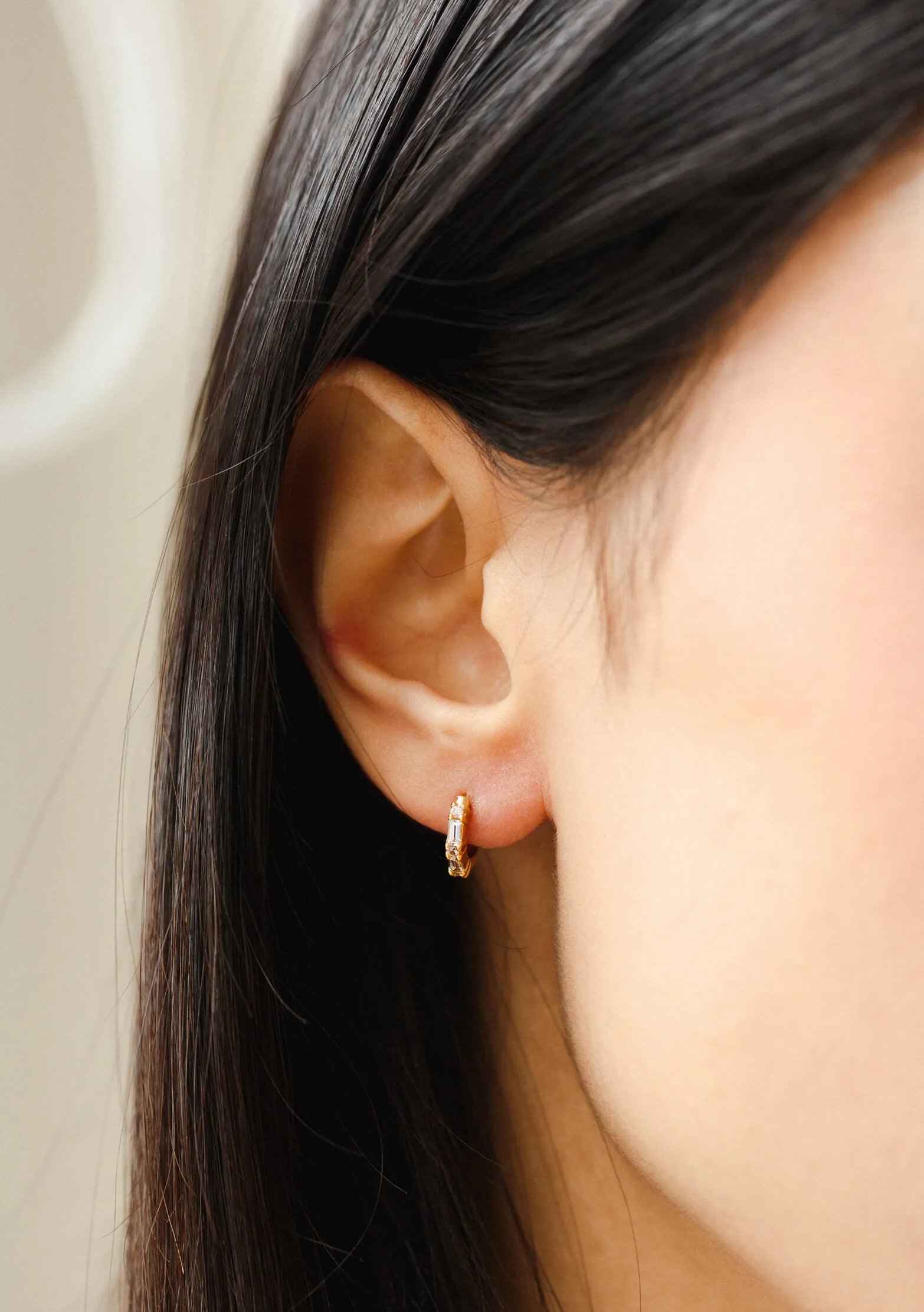 Grace White Sapphire Huggie Hoops sold by GLDN product image thumbnail 5