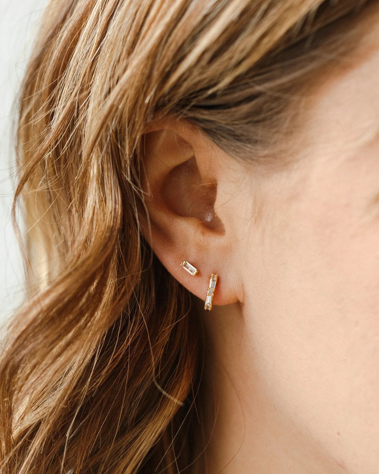 Grace White Sapphire Huggie Hoops sold by GLDN product image thumbnail 3