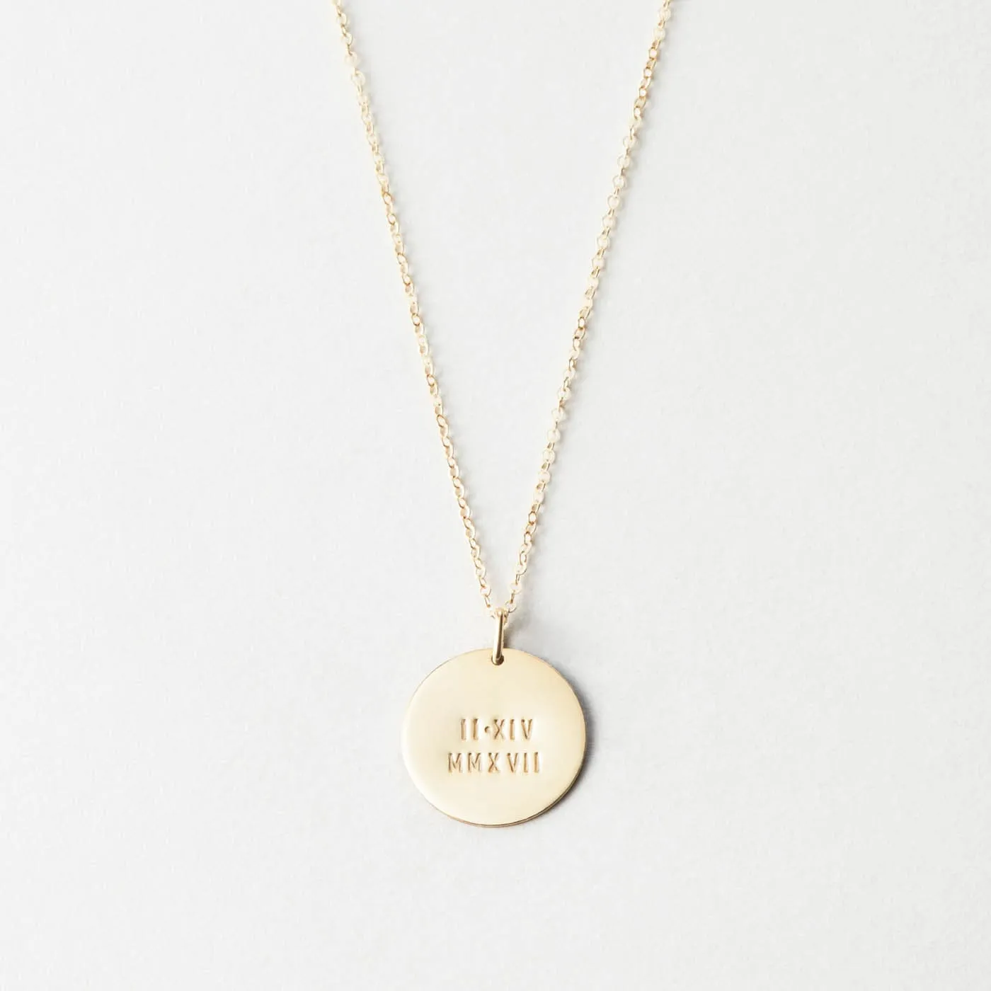 Numerals Disk Necklace sold by GLDN