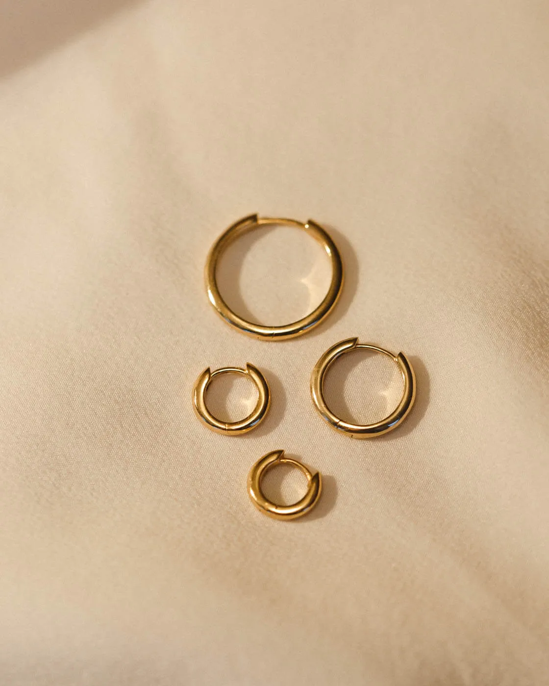 Olivia Huggie Hoops sold by GLDN product image thumbnail 3