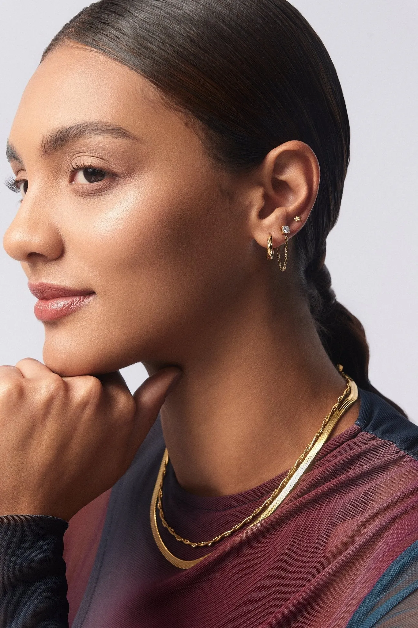 Twisted Gold Hoops sold by Flaire & Co. product image thumbnail 3