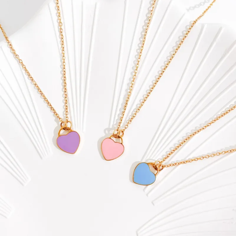 Enamel Heart Necklaces in Gold (Not A Set) sold by Flaire & Co.