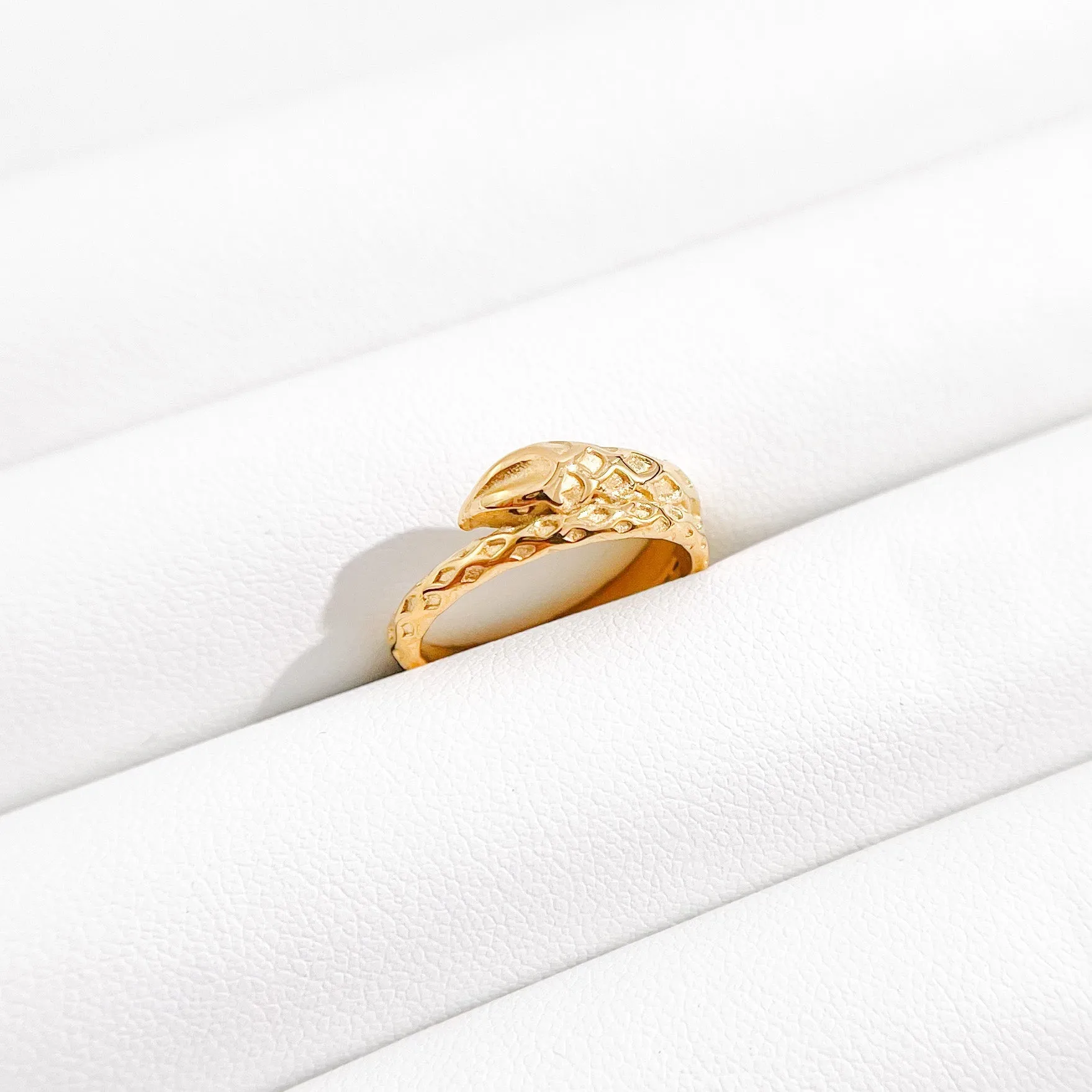Serpent Ring in Gold sold by Flaire & Co.