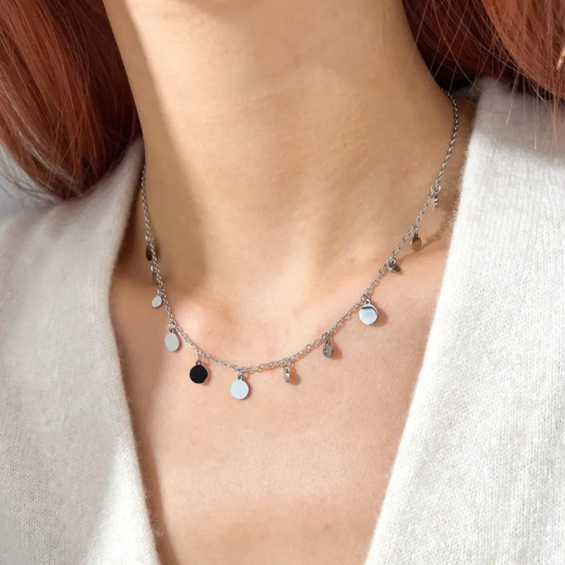 Dangling Disk Necklace in Silver sold by Flaire & Co.