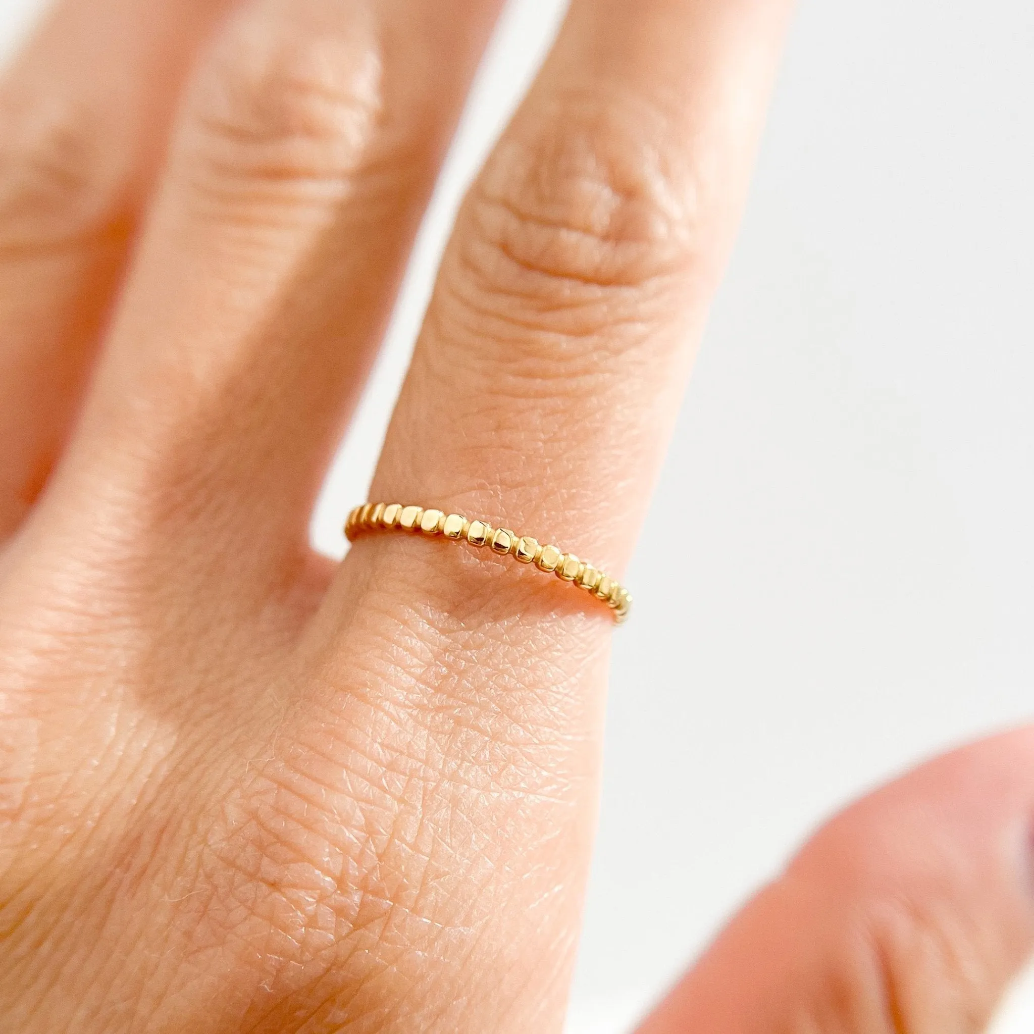 Thin Beaded Band Gold Ring sold by Flaire & Co. product image thumbnail 2