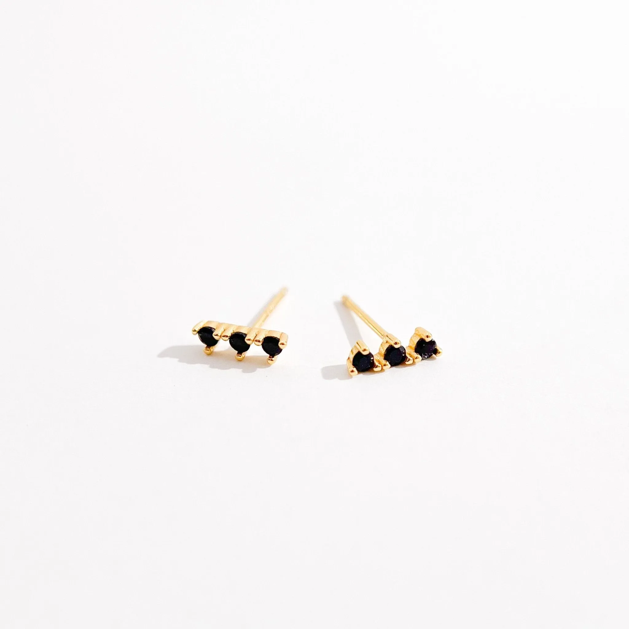 Black Trio Gem Studs in Gold sold by Flaire & Co.