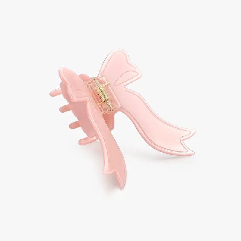 Pink Bow Claw Clip sold by Flaire & Co.
