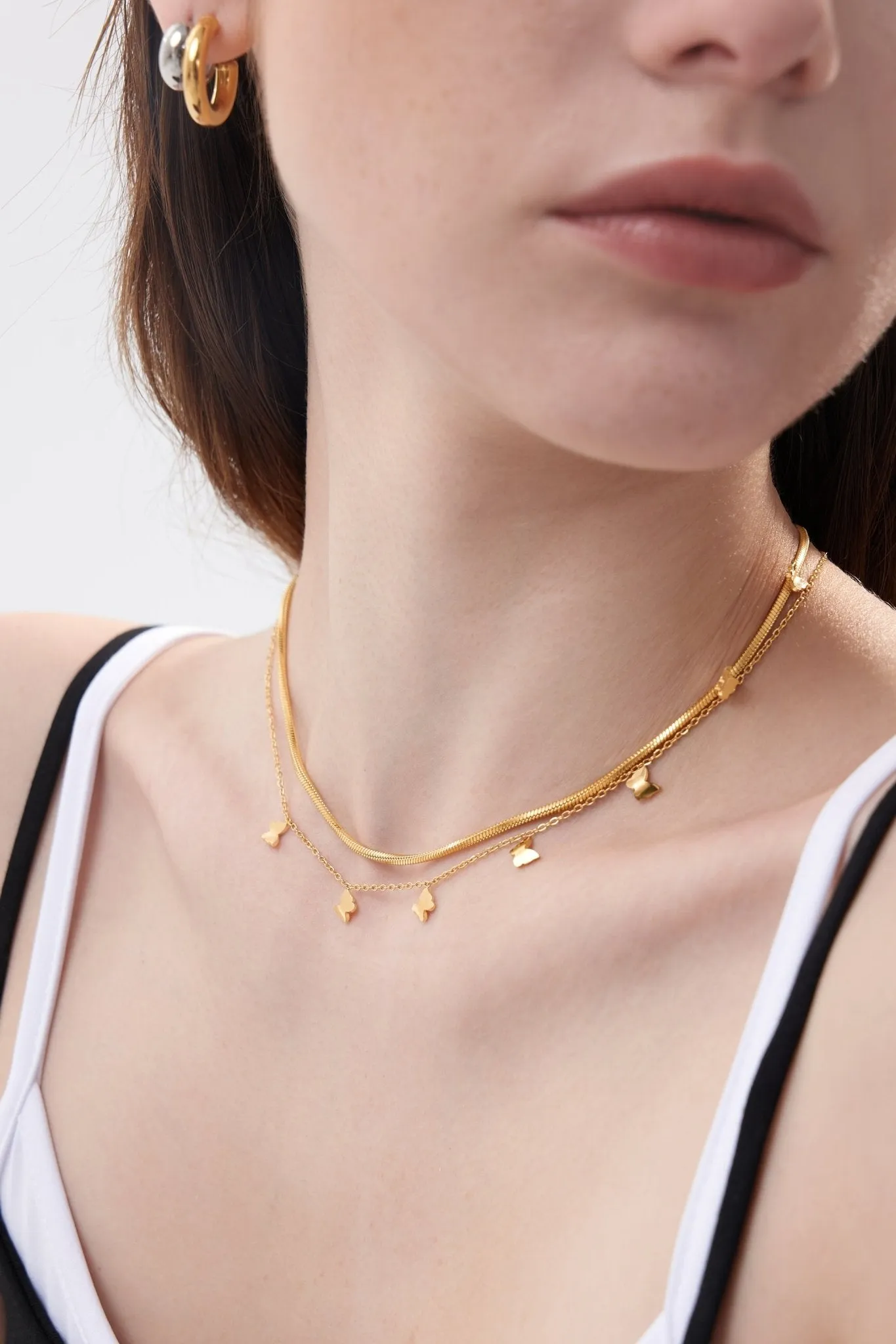 Dangling Butterfly Necklace in Gold sold by Flaire & Co. product image thumbnail 2