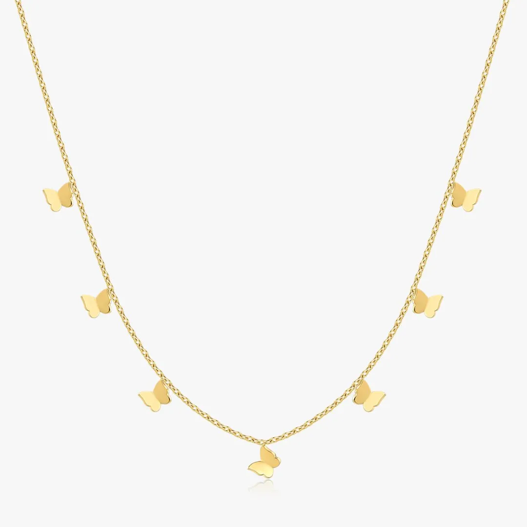 Dangling Butterfly Necklace in Gold sold by Flaire & Co.