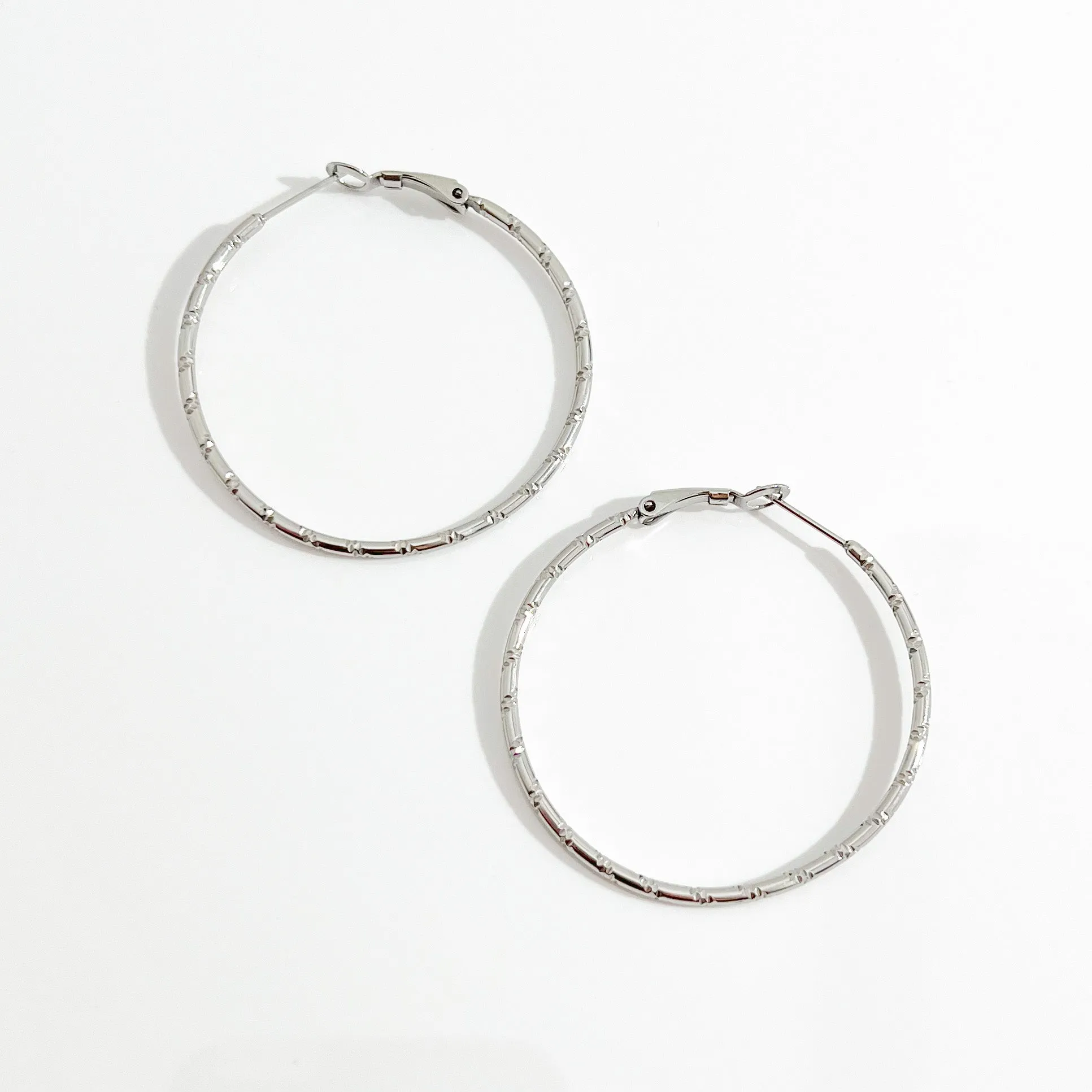 Thin Bamboo Large Silver Hoops sold by Flaire & Co. product image thumbnail 4